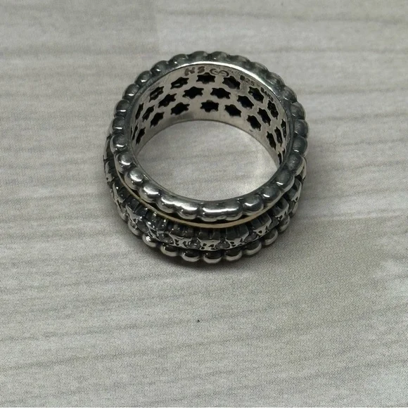 14k Solid Gold & 9.25 S. Silver spinning ring with zircons